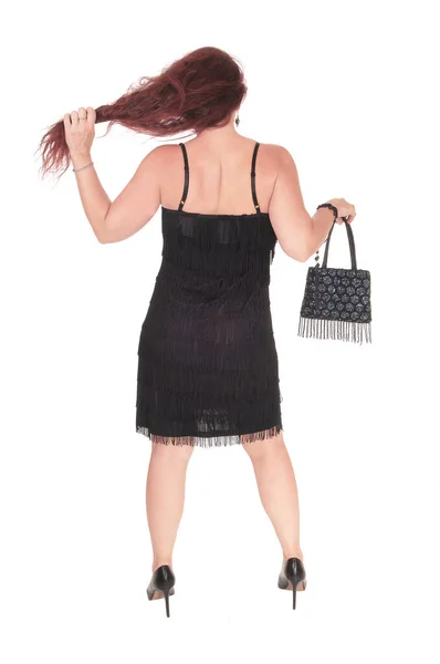 Eine Schöne Frau Steht Einem Schwarzen Kleid Von Hinten Mit — Stockfoto