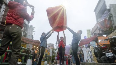 New Taipei City, Taiwan - 14 Feb, 2019 : Pingxi, Jingtong, Xinbei City, attracts tourists to the sky lanterns around the annual Lantern Festival clipart