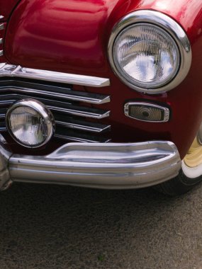 part of a red classic vintage car 