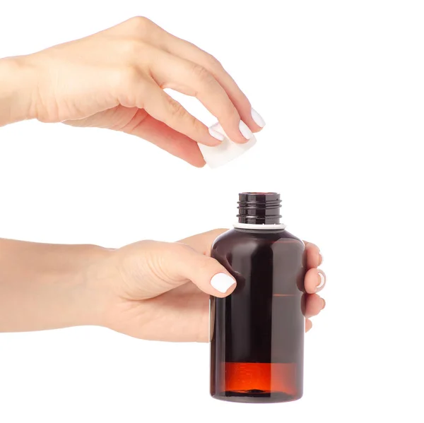 Пластиковая бутылка с лекарством в руке — стоковое фото