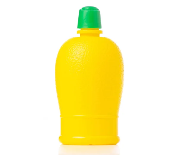 Bouteille jaune avec jus de citron — Photo