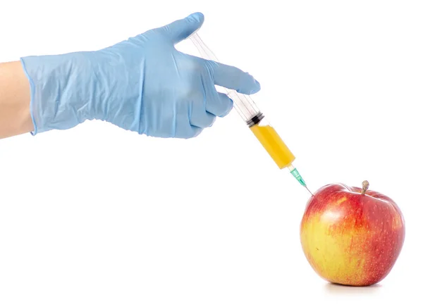 In de handen van een appel syringe — Stockfoto