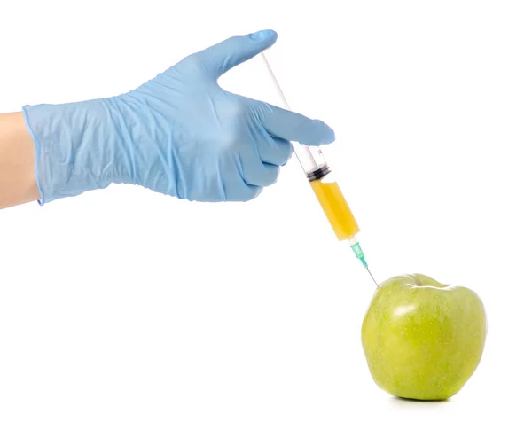 In de handen van een appel syringe — Stockfoto