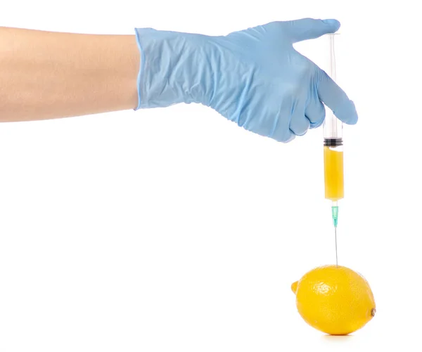 In de handen van citroen syringe — Stockfoto