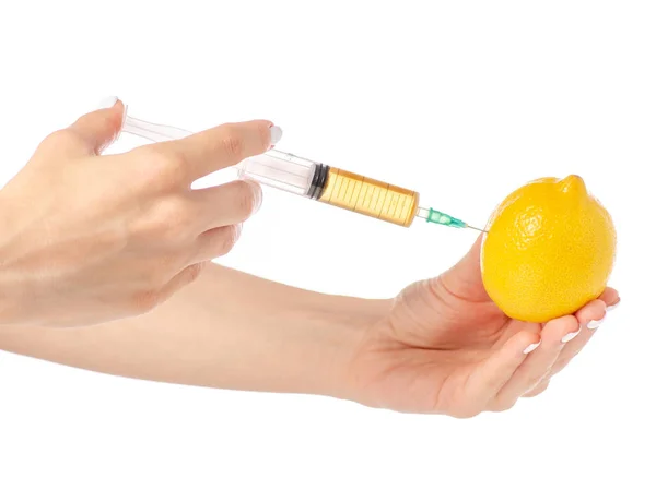 In de handen van citroen syringe — Stockfoto