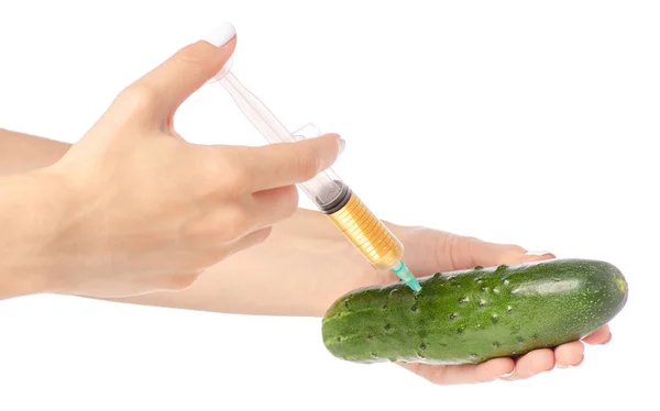 In de handen van komkommer syringe — Stockfoto