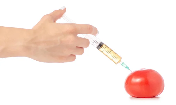 トマトの手に注射器します。 — ストック写真