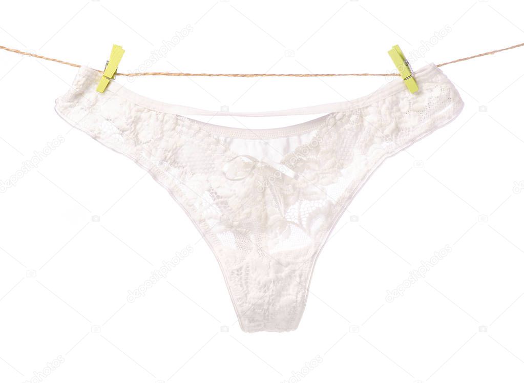 White female panties clothespins rope