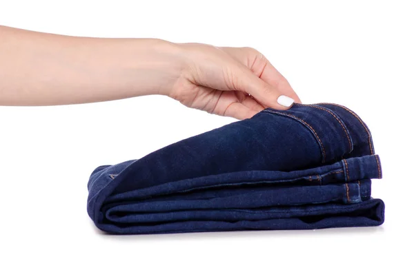 Calça jeans azul nas mãos — Fotografia de Stock