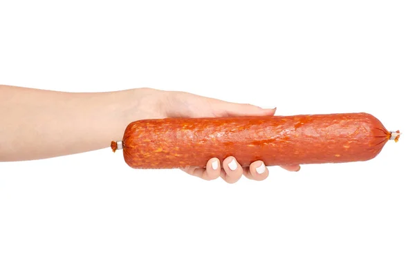 Una salsiccia affumicata in mano — Foto Stock