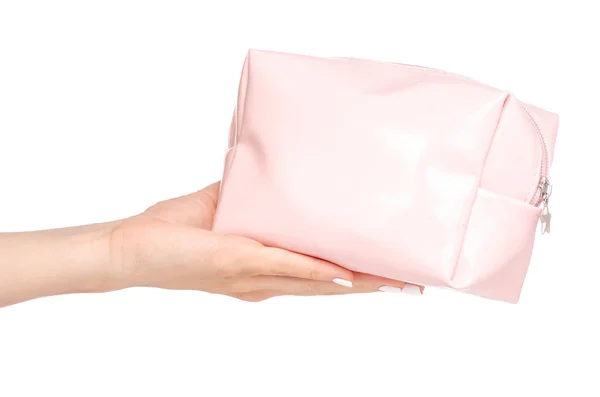 Um saco cosmético feminino na mão — Fotografia de Stock