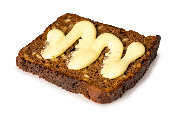 Pedaço de pão com maionese molho — Fotografia de Stock