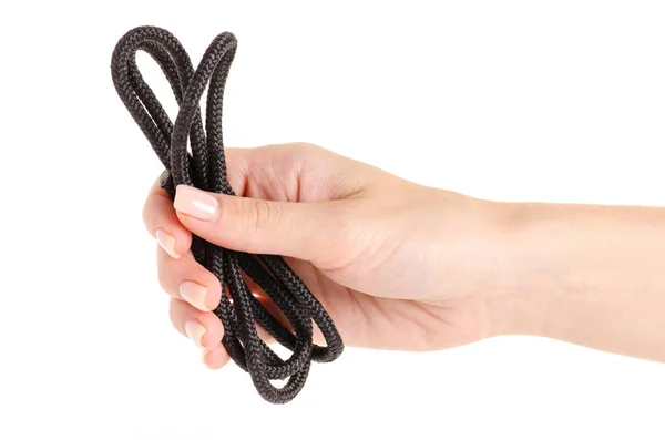 Cuerda negra en la mano — Foto de Stock