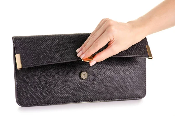 Embreagem de saco de couro preto feminino na mão — Fotografia de Stock