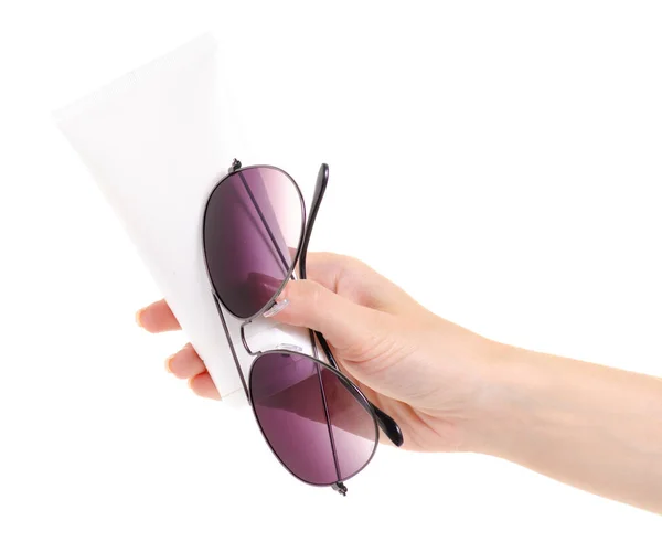 Sluneční brýle opalovací krém na ruce — Stock fotografie