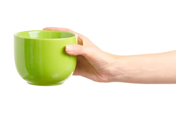 Taza de taza verde en la mano —  Fotos de Stock