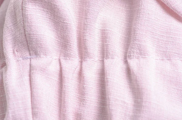 Ropa de tela lino rosa costura macro —  Fotos de Stock