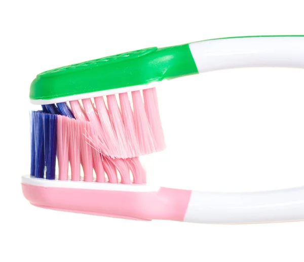 Two toothbrushes green pink macro — Stock Photo, Image