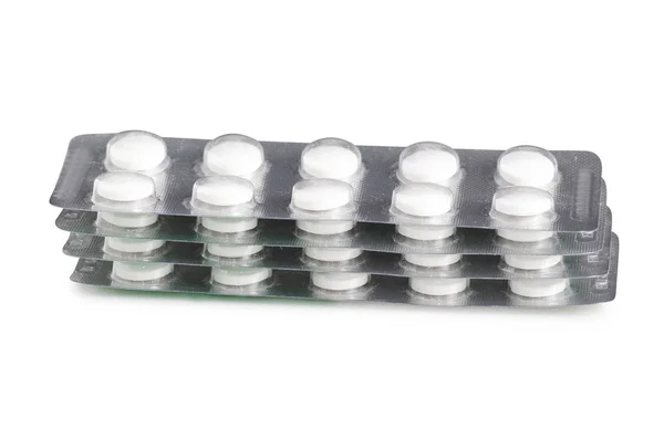 Médicaments en plaquettes thermoformées, comprimés, isolés sur fond blanc — Photo