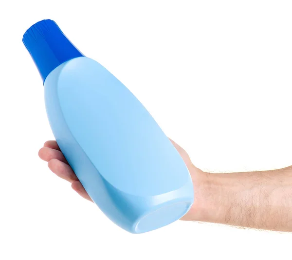 Bottle with the conditioner for linen clothes in hand — Stock Photo, Image