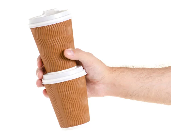 Dva šálky kávy s víčky v ruce — Stock fotografie