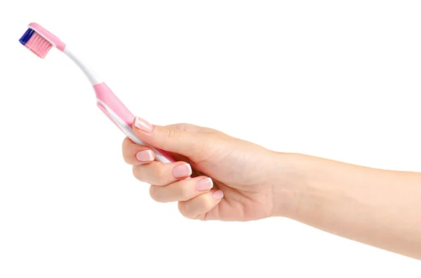 Toothbrush in hand — Stock Photo, Image