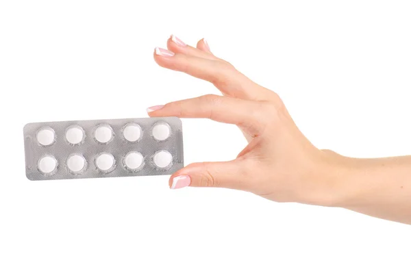 Pílulas de medicamentos em blister, comprimidos de medicamentos na mão isolados em fundo branco — Fotografia de Stock