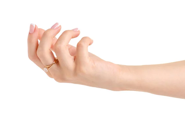 Mão feminina com um anel de ouro — Fotografia de Stock