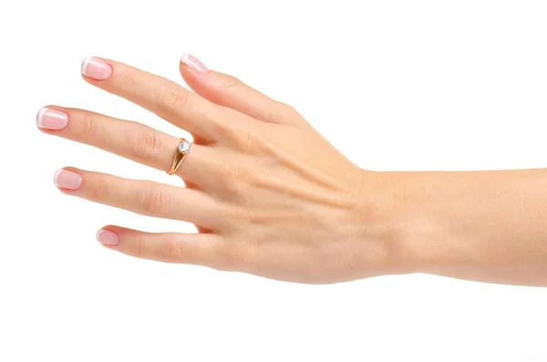 Mano femenina con anillo de oro — Foto de Stock