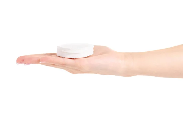 Wadded cotton pads in a hand — Stock Photo, Image