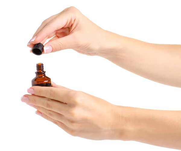 Fles van de geneeskunde jodium in de hand — Stockfoto