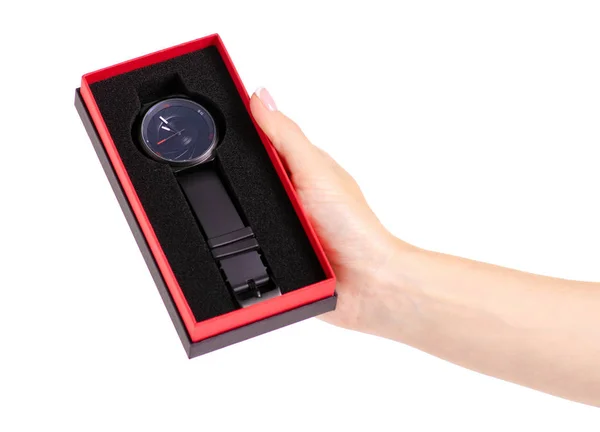 Το μαύρο ρολόι σε ένα κουτί στο χέρι — Φωτογραφία Αρχείου