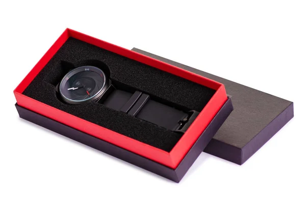 El reloj negro en una caja —  Fotos de Stock