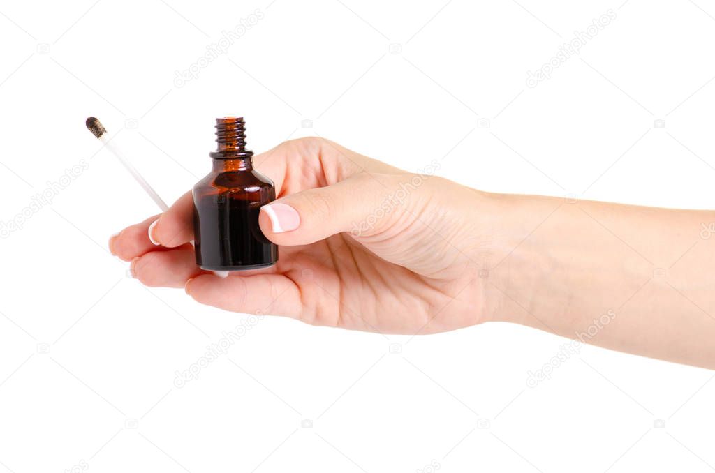 Bottle of medicine Iodine in the hand