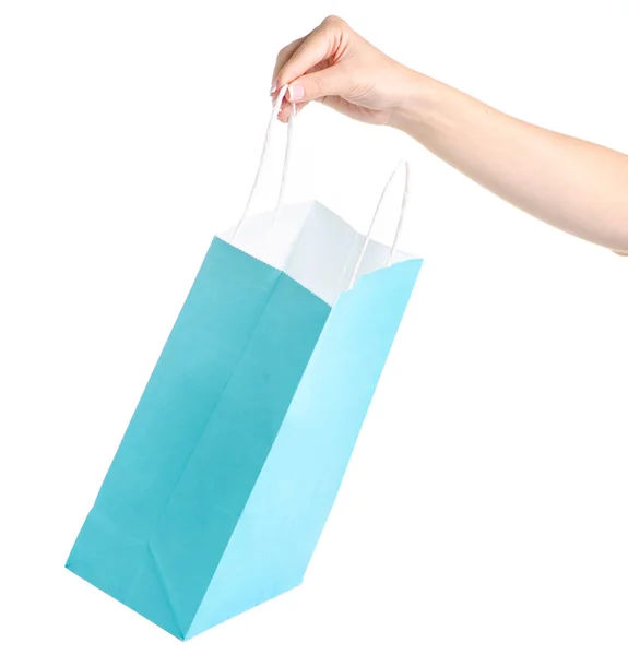 Πακέτο μπλε τιρκουάζ χαρτί στο χέρι τσάντα ψώνια μόδας κατάστημα — Φωτογραφία Αρχείου