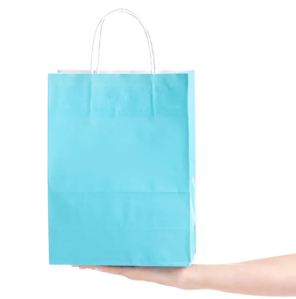 Blue turquoise paper package bag in hand shop shopping fashion — Stock Photo, Image