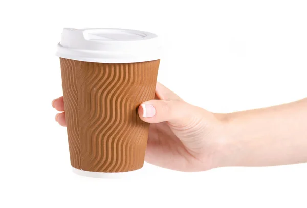 Kopje koffie met een deksel in een hand — Stockfoto