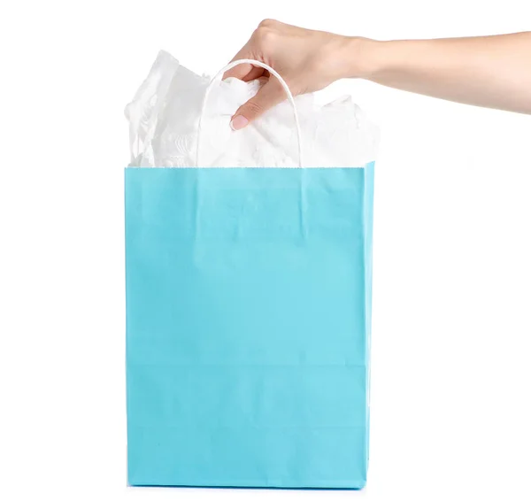 Blue turquoise paper package bag in hand shop shopping dress fashion — Stock Photo, Image