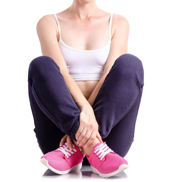 Woman in sports pants sneakers