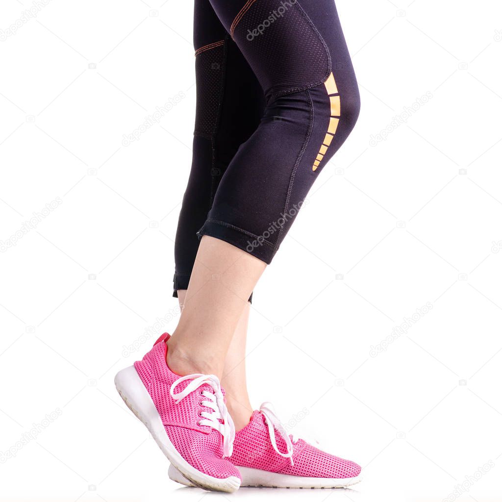 Female legs sports leggings sneakers sports exercises