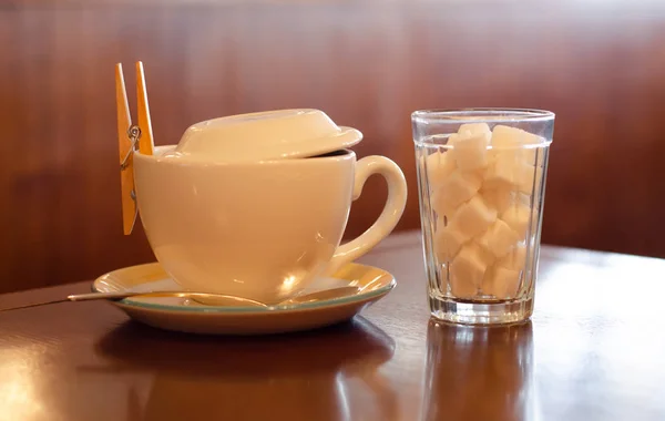 Die Tasse Tee ein Glas Zucker — Stockfoto