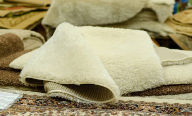 Carpets samples in the store clipart