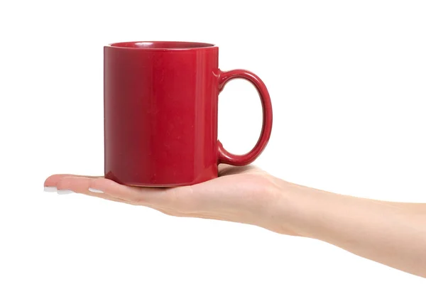 Taza roja en la mano —  Fotos de Stock