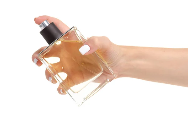 Frasco de perfume en la mano — Foto de Stock