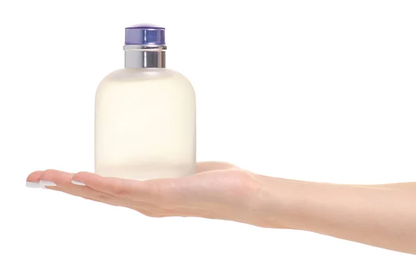 Frasco de perfume en la mano — Foto de Stock