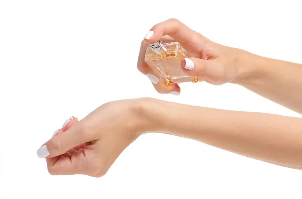 Frasco de perfume en la mano —  Fotos de Stock