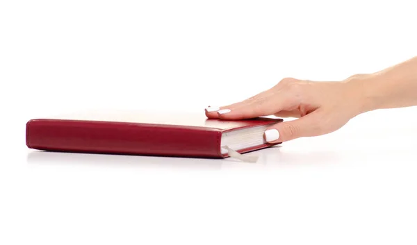 Czerwony dziennik w dłoni — Zdjęcie stockowe