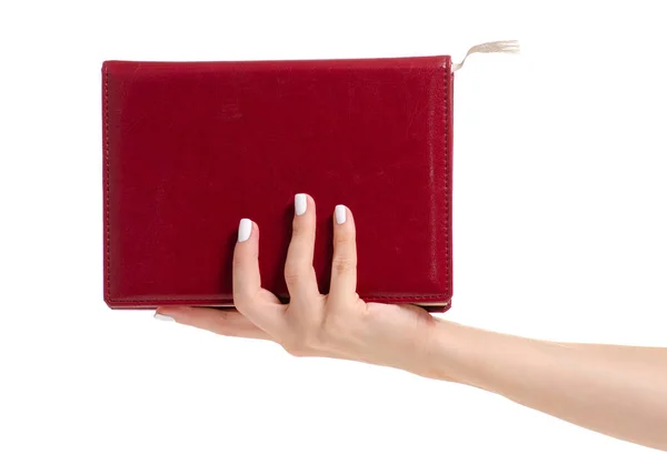 Rotes Tagebuch in der Hand — Stockfoto