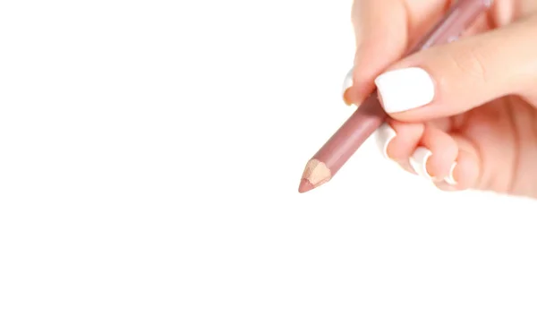 Crayon pour les lèvres à la main — Photo