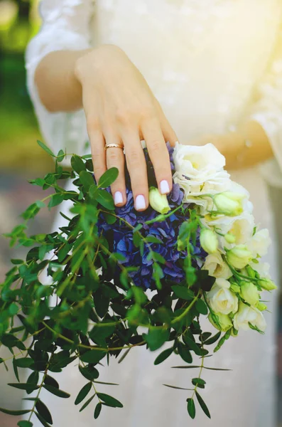 Bride flowers hands ring